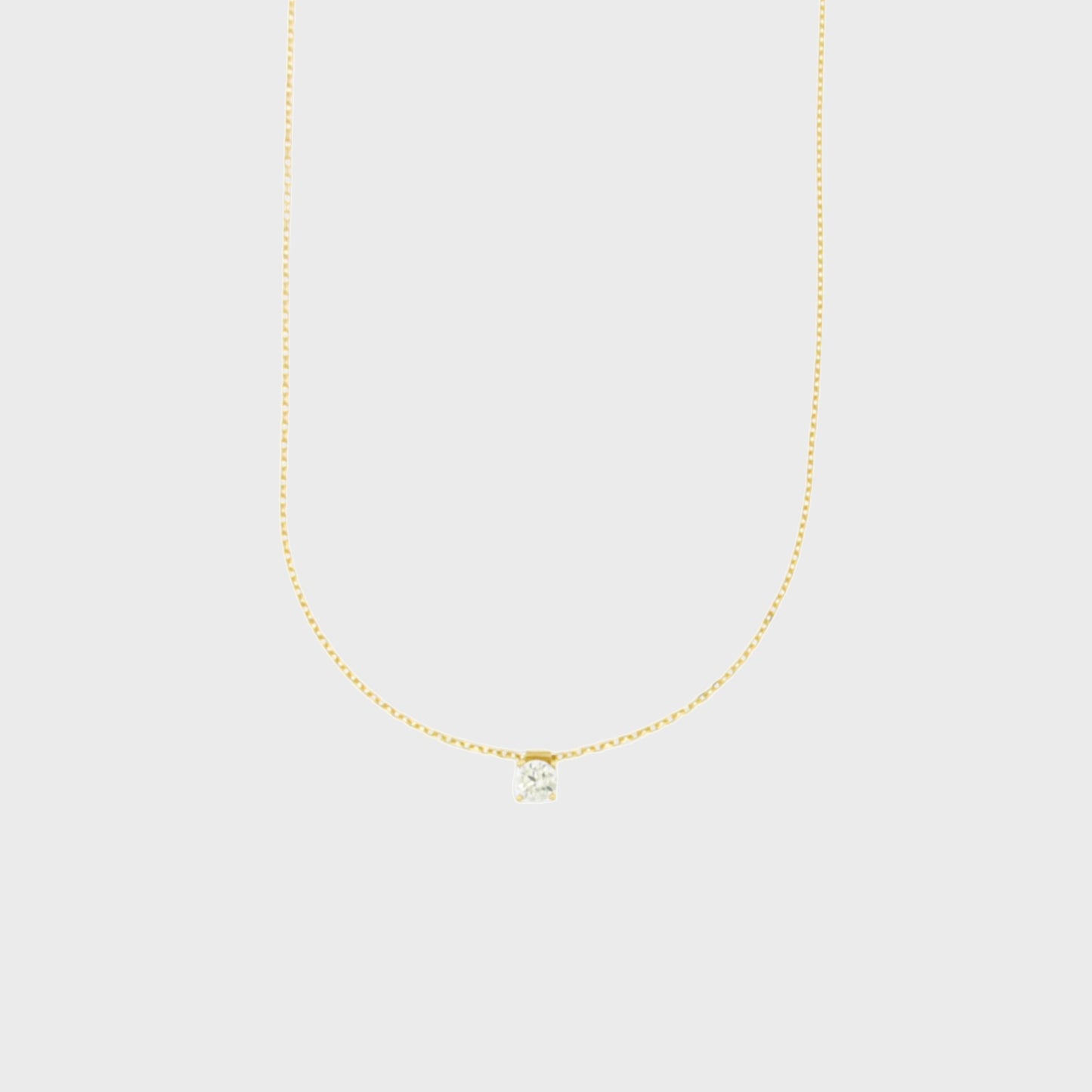 Collana corta catenina rollò in oro 9 kt e punto luce in zircone