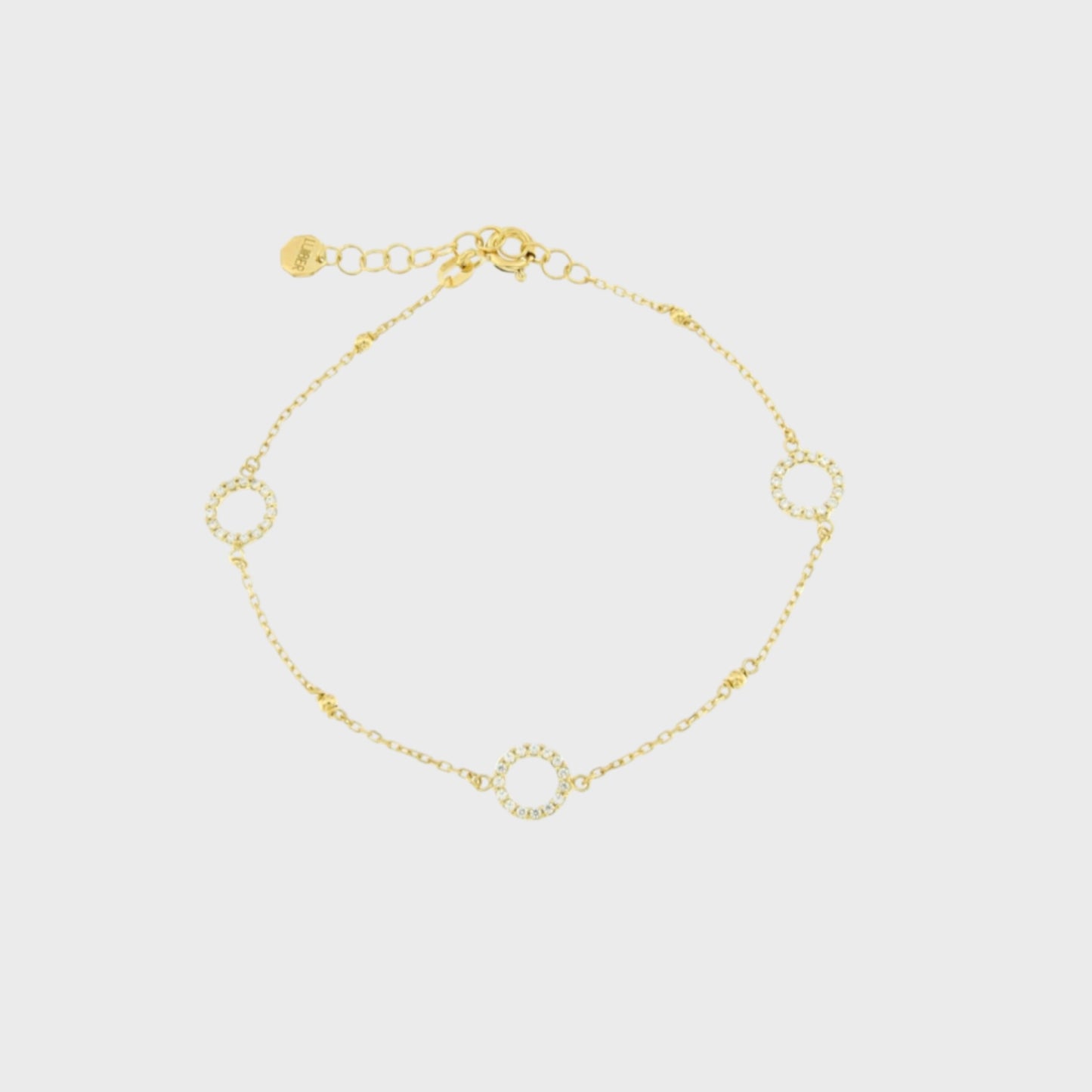 Bracciale catenina rollò in oro 9 kt con 3 cerchietti con zirconi distanziati