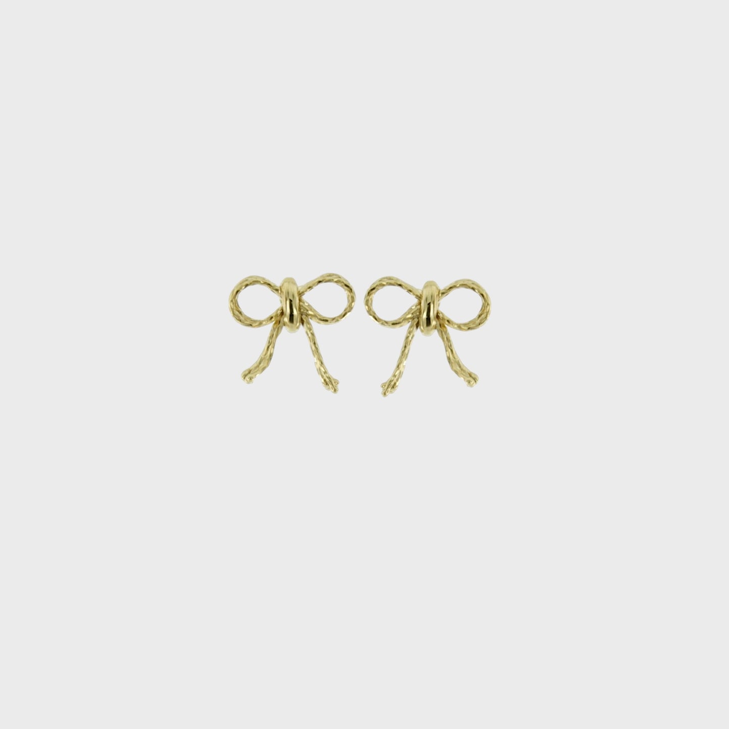 Orecchini fiocchetto in oro 9kt
