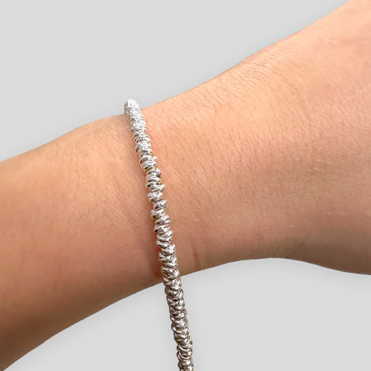 Titolo prodotto: Bracciale nodini in argento 925 - Design minimalista e raffinato