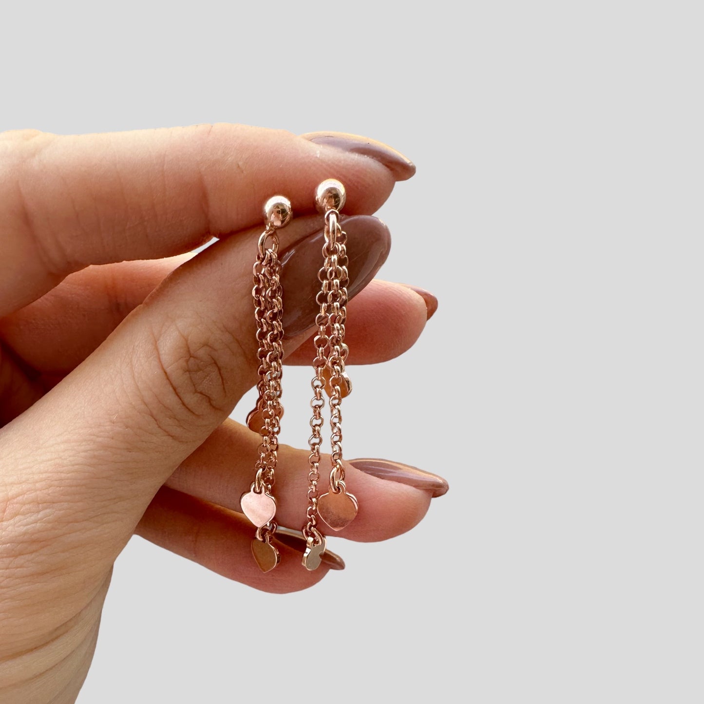 Orecchini Pendenti in Argento 925 Placcato Oro Rosa con Tre Catenelle e Tre Cuori Pendenti
