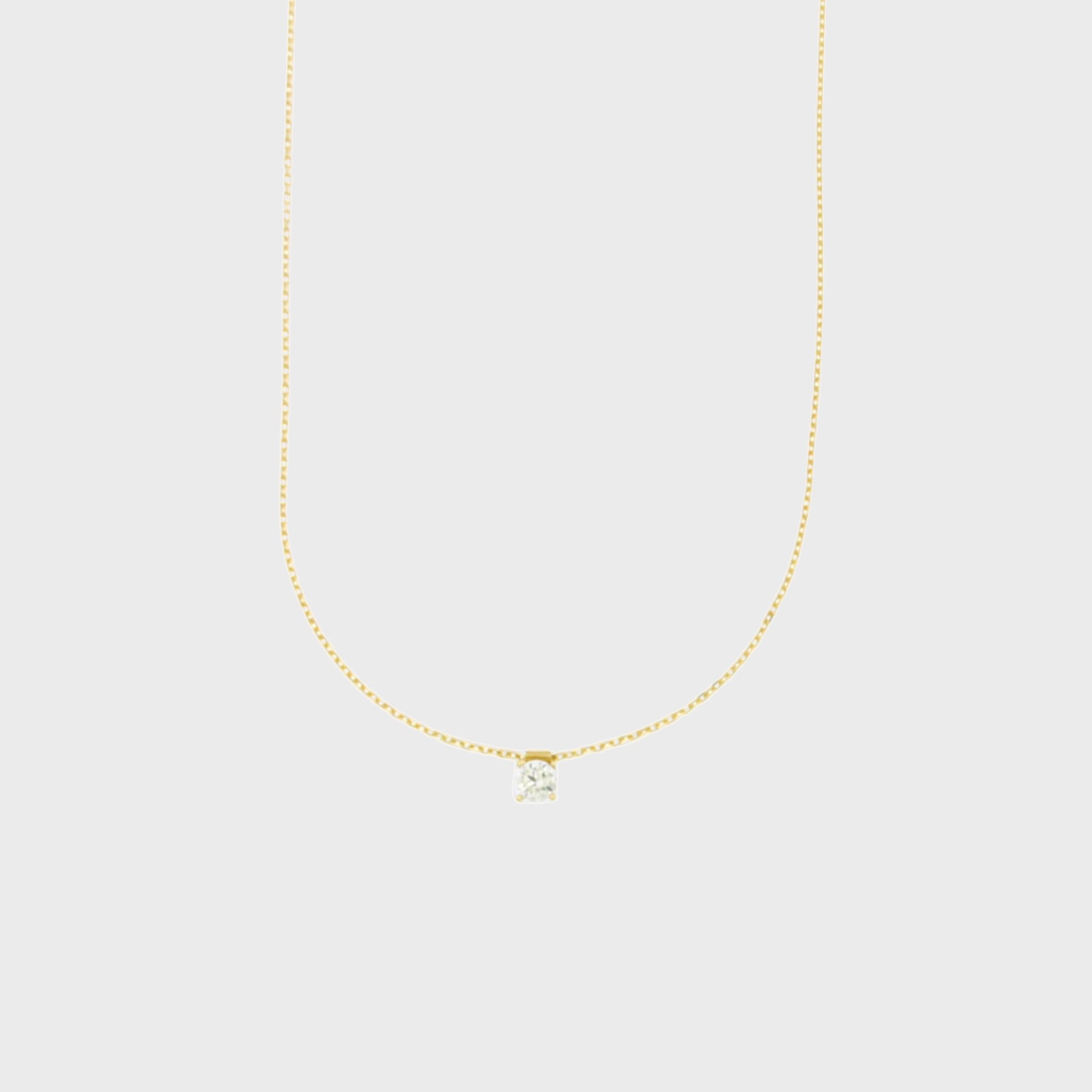 Collana corta catenina rollò in oro 9 kt e punto luce in zircone