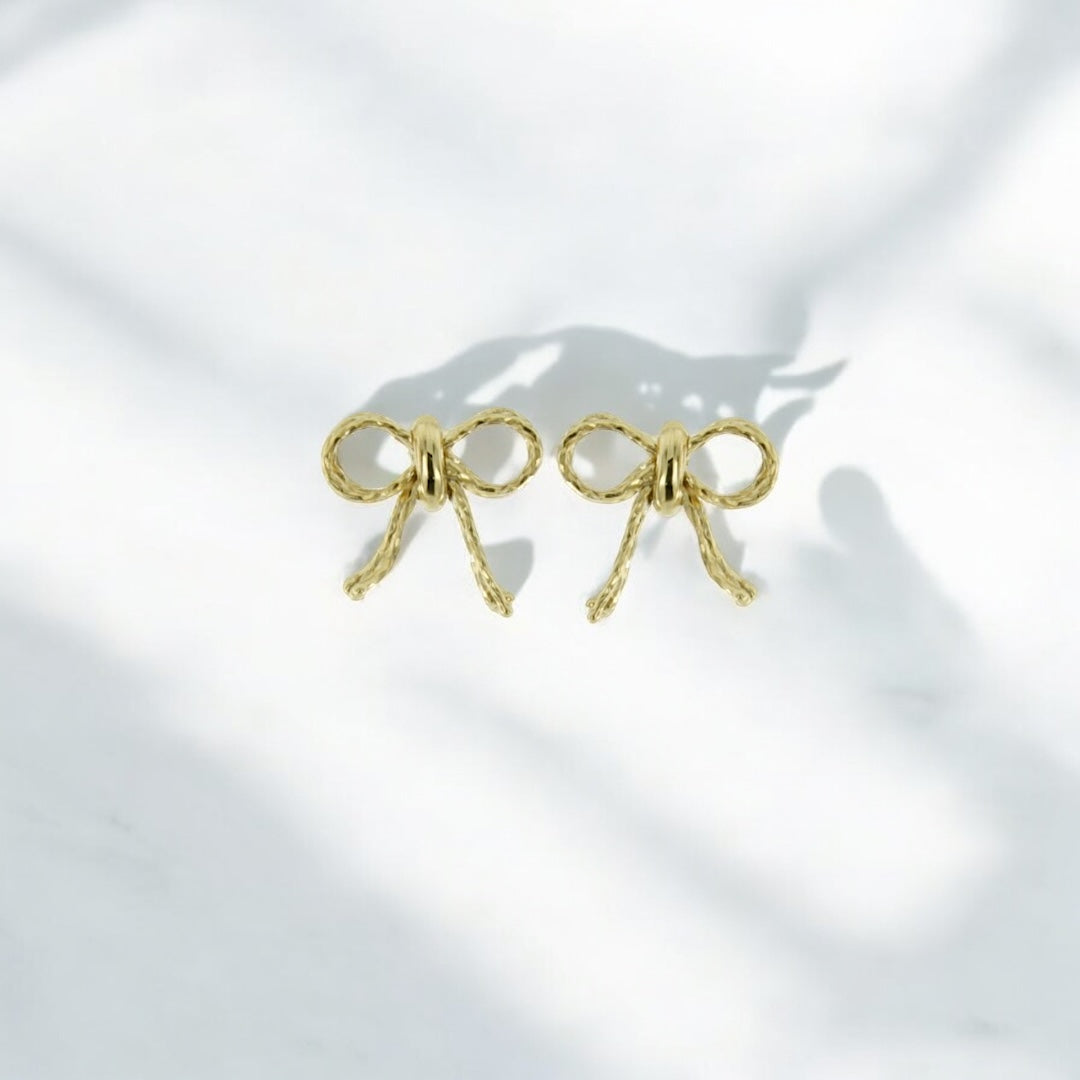 Orecchini fiocchetto in oro 9kt