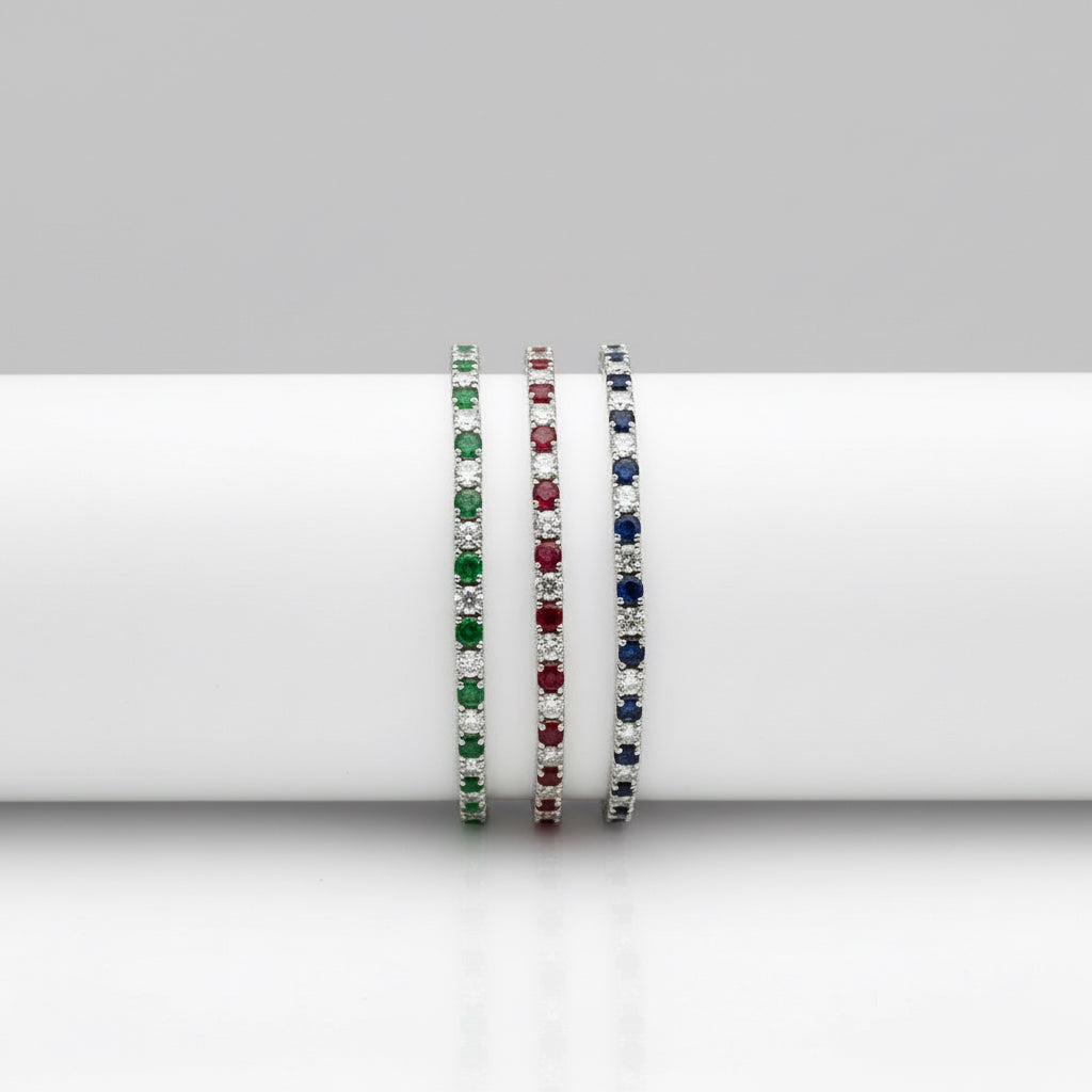 #Bracciale tennis  mm4 con zirconi alternati trasparente rosso, trasparente blu e trasparente verde in argento 925 rodiato, chiusura a cassetto con 2 otto di sicurezza