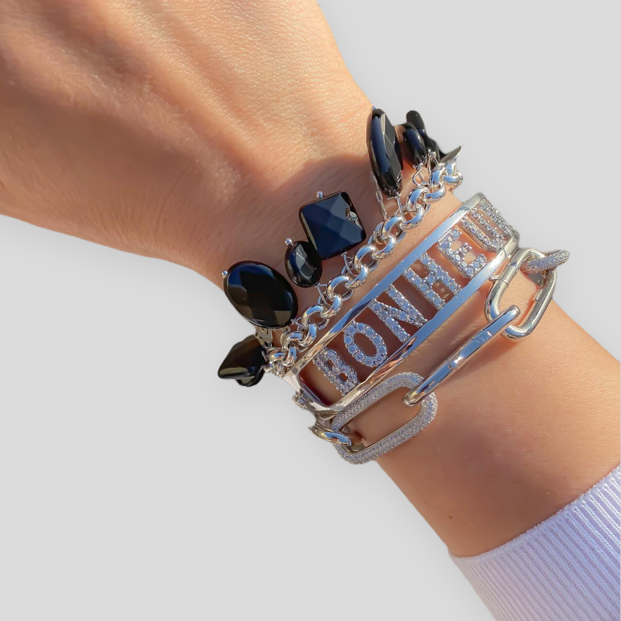 Bracciale rollò con charms logo Rossella Gioielli in argento 925 e onice